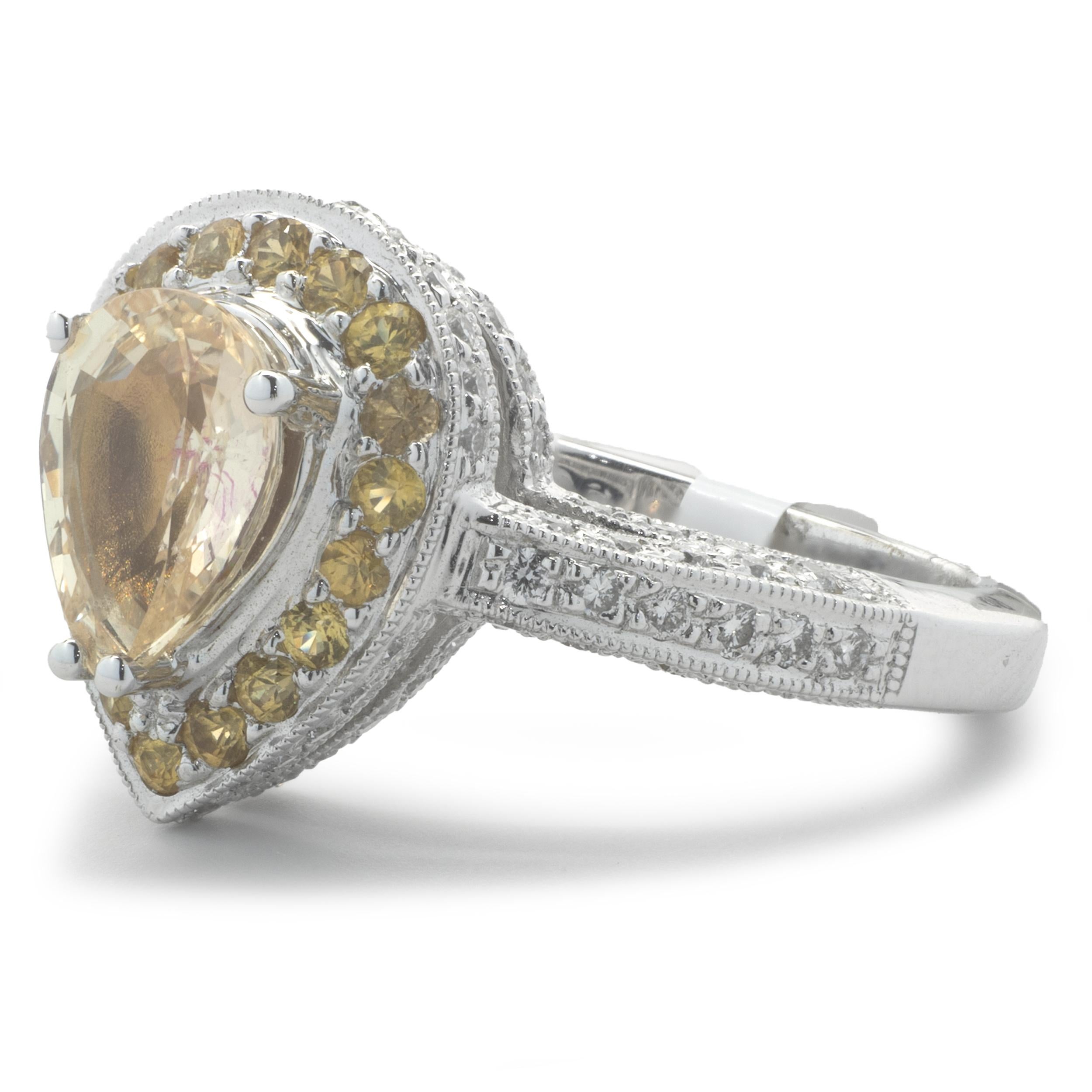 Pear Cut 18 Karat White Gold Yellow Sapphire and Diamond Ring For Sale