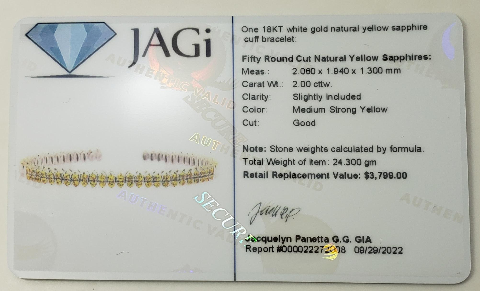 Vintage 18 Karat White Gold Yellow Sapphire Bracelet JAGi Certified-

This stunning cuff bracelet features 50 round cut natural yellow sapphires set in beautifully detailed 18K white gold. Width: 6 mm.

Total sapphire weight: 2.0 ct.

Size: 7 inches
