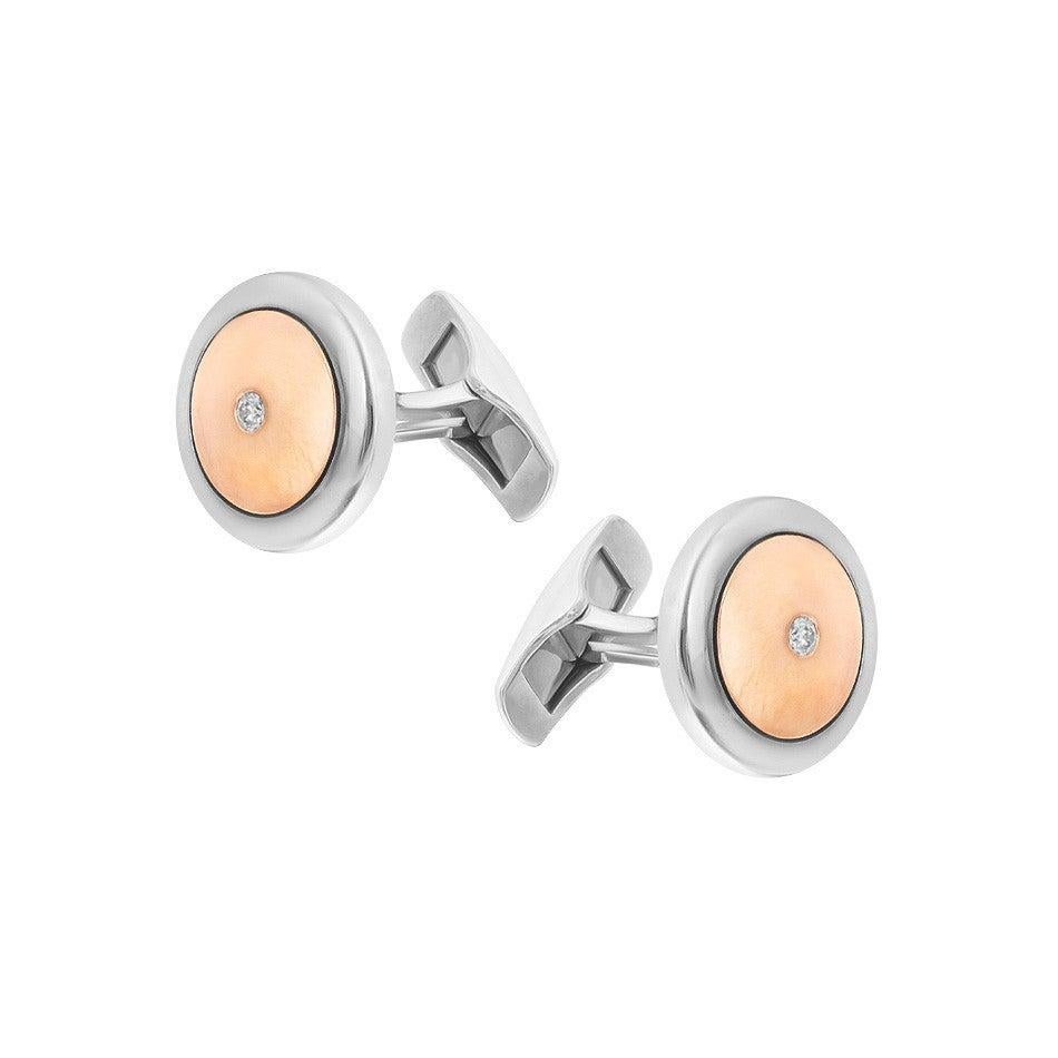 Cufflinks White Pink Gold 18 K

Diamond 2-RND-0,09-F/VS1A

Weight 13.11 gram

With a heritage of ancient fine Swiss jewelry traditions, NATKINA is a Geneva based jewellery brand, which creates modern jewellery masterpieces suitable for every day