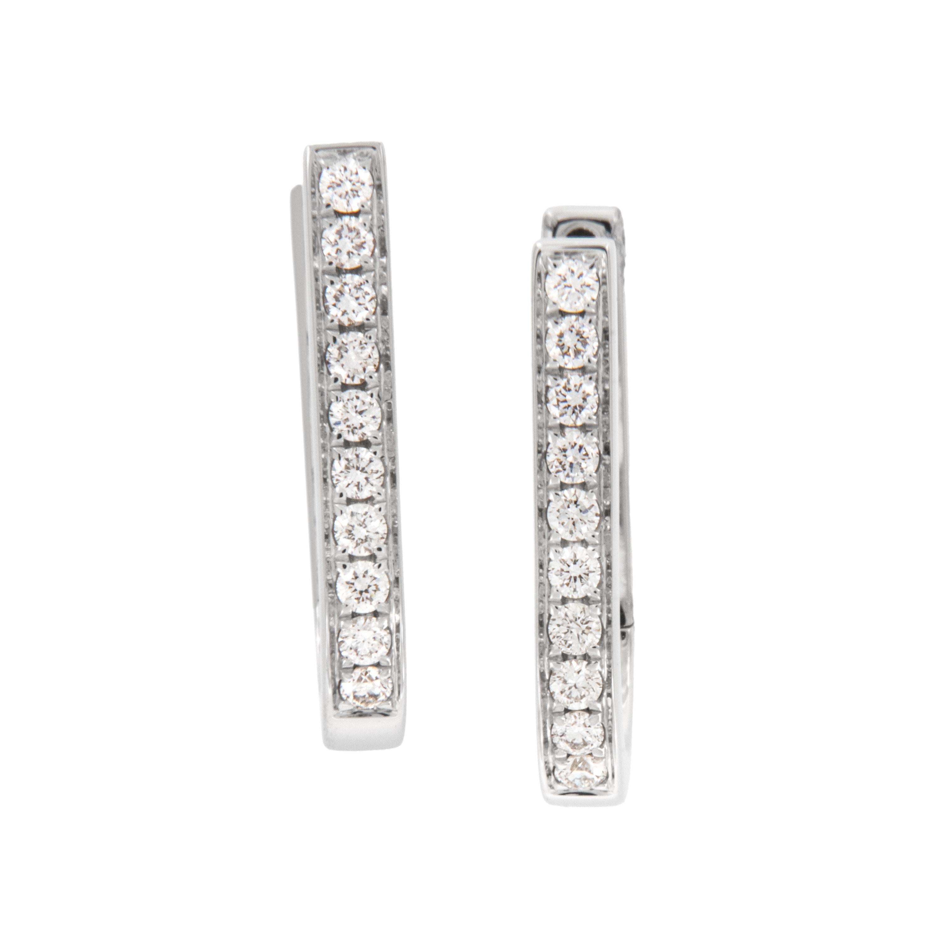 Diese hübschen und modernen Ohrringe sind perfekt für das Büro, jeden Tag oder wann immer Sie wollen! Sie sind aus 18 Karat Weißgold gefertigt, U-förmig für einen modernen Look und enthalten 20 Diamanten - 0,21 Cttw (VS G-H). Die Ohrstecker rasten