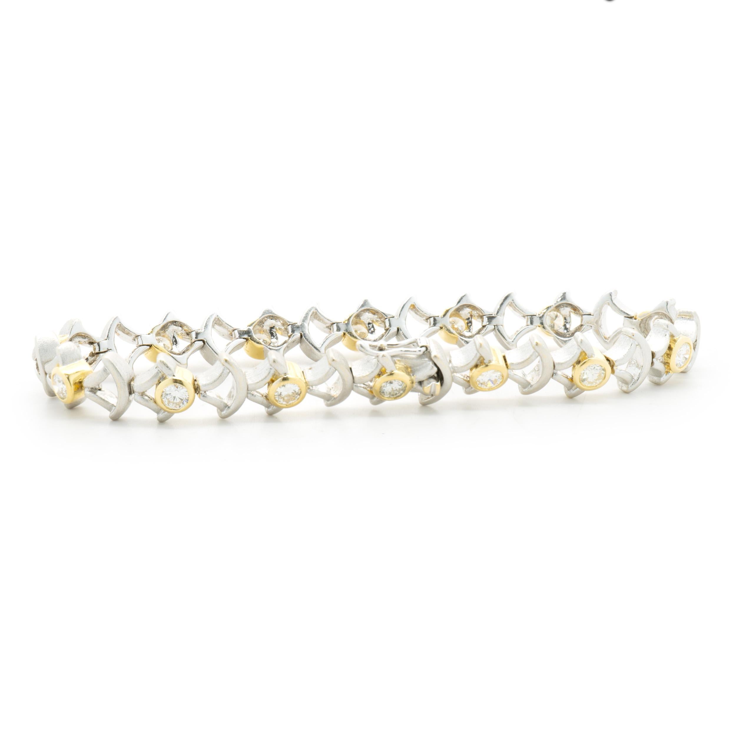 Designer: custom design
Material: 18K white & yellow gold
Diamond: 14 round brilliant cut = 1.80cttw
Color: J / K / L
Clarity: SI1-2
Dimensions: bracelet will fit up to a 6-inch wrist
Weight: 17.64 grams