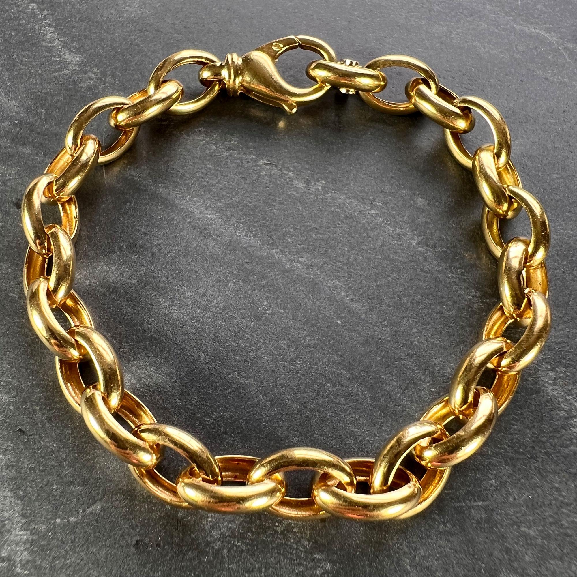An 18 karat white and yellow gold chunky oval link bracelet with a lobster clasp. 7.5” long. Stamped 750 for 18 karat gold with an unknown maker's mark.

Dimensions: 19 x 0.8 x 0.8 cm
Weight: 17.34 grams
