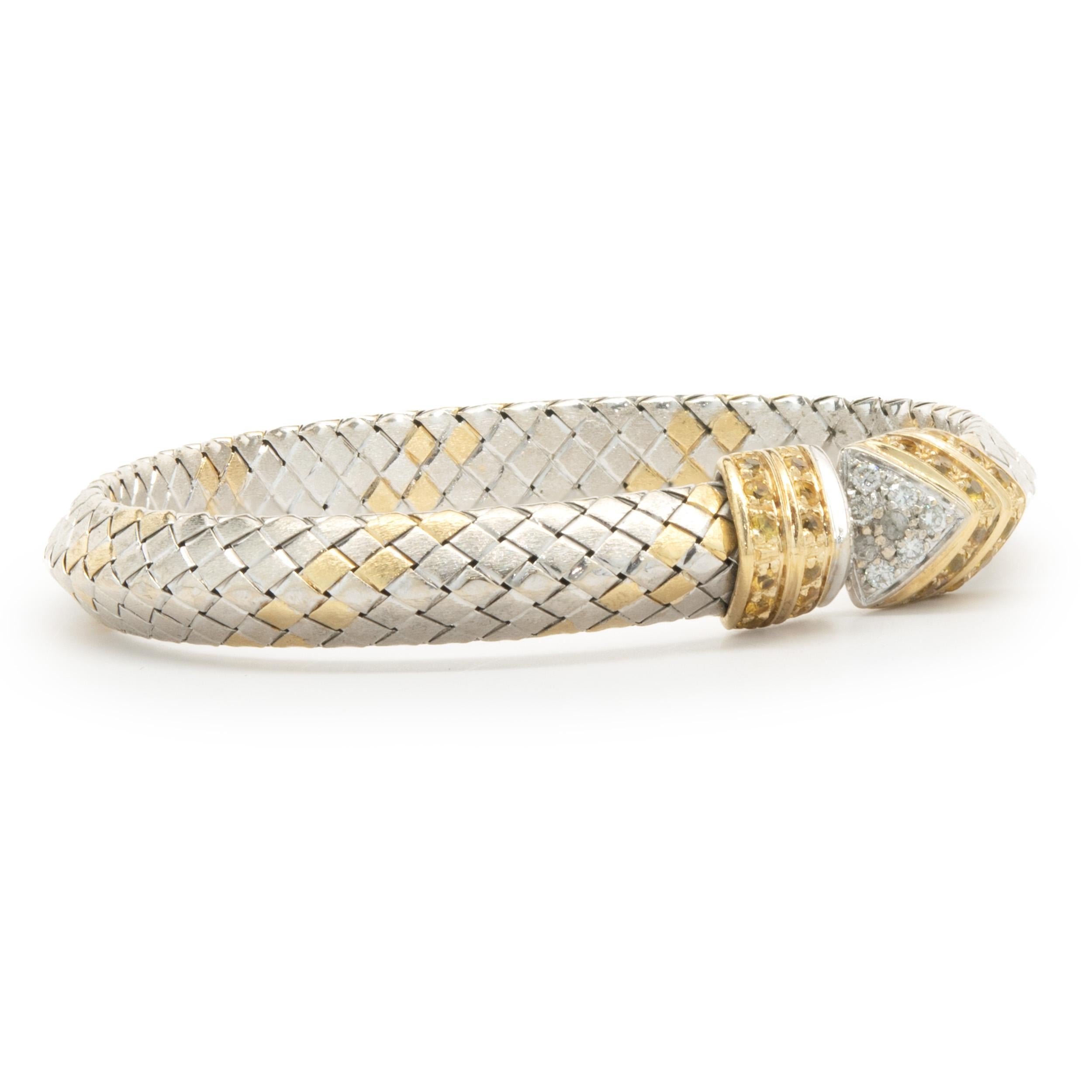 Designer: custom design
Material: 18K white & yellow gold
Diamonds: 16 round brilliant cut = 0.16cttw
Color: H
Clarity: SI2
Dimensions: bracelet will fit up to a 6.5-inch wrist
Weight: 29.91 grams