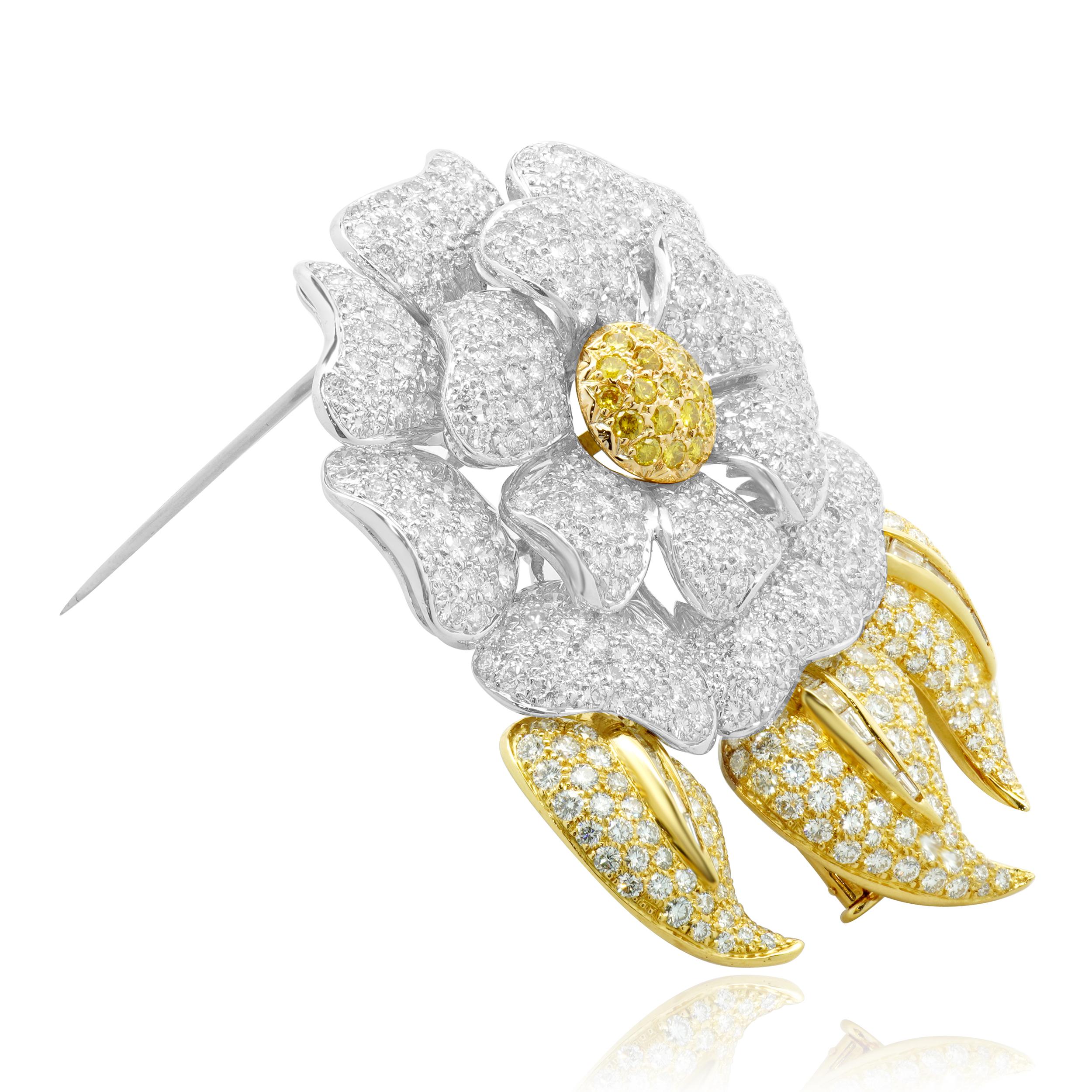 Designer: custom
Material: 18K white & yellow gold
Diamond: 453 round brilliant & 14 baguette cut = 14.12cttw
Color: G
Clarity: VS2
Diamond: 30 round brilliant cut = 0.60cttw
Color: Fancy Yellow
Clarity: SI1
Weight: 49.44 grams
