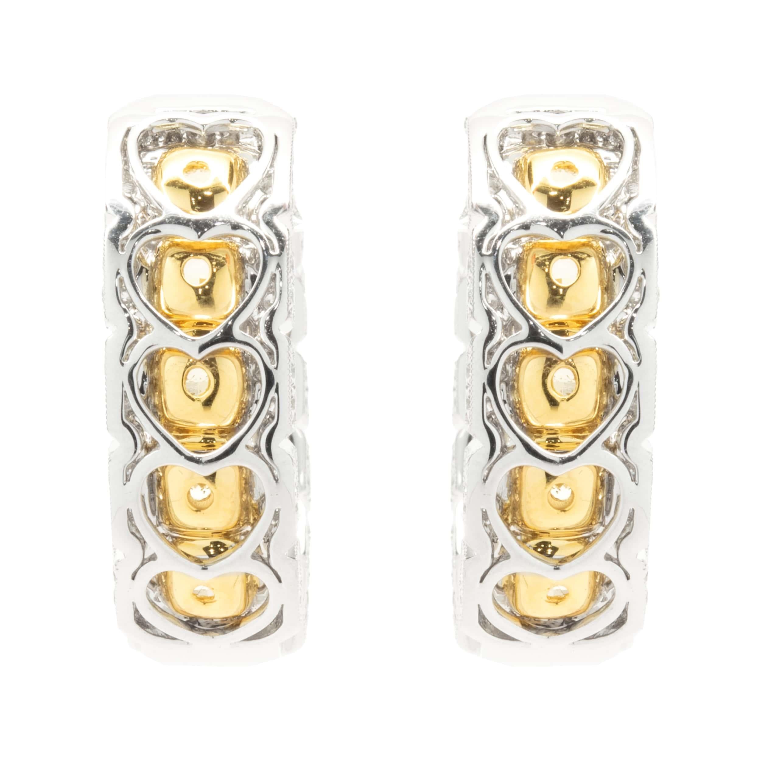 Designer: custom design
Material: 18K white & yellow gold
Diamond: 24 cushion cut = 7.67cttw
Color: Fancy Yellow
Clarity: SI1
Diamond: 288 round brilliant cut = 2.01cttw
Color: G
Clarity: VS2
Dimensions: earrings measure 27mm long
Weight: 29.26 grams