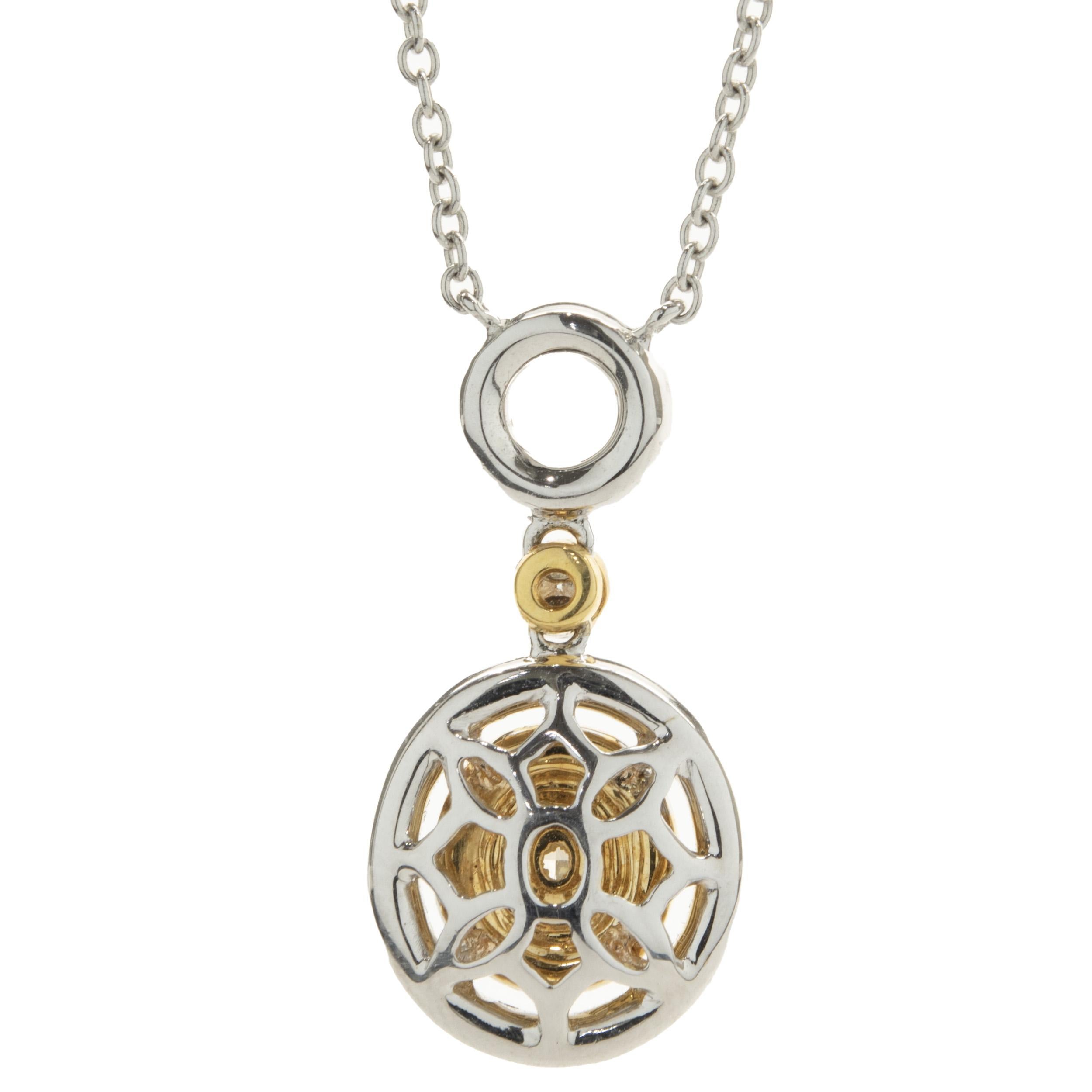 Designer: custom	
Material: 18K white & yellow gold
Diamonds: 1 oval cut = .39ct
Color: Fancy yellow
Clarity: SI1
Diamonds: round brilliant cut= .07cttw
Color: Fancy yellow
Clarity: SI1
Diamonds: round brilliant cut = .32cttw
Color: G
Clarity: