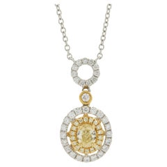 18 Karat White & Yellow Gold Fancy Yellow Oval Cut Diamond Necklace