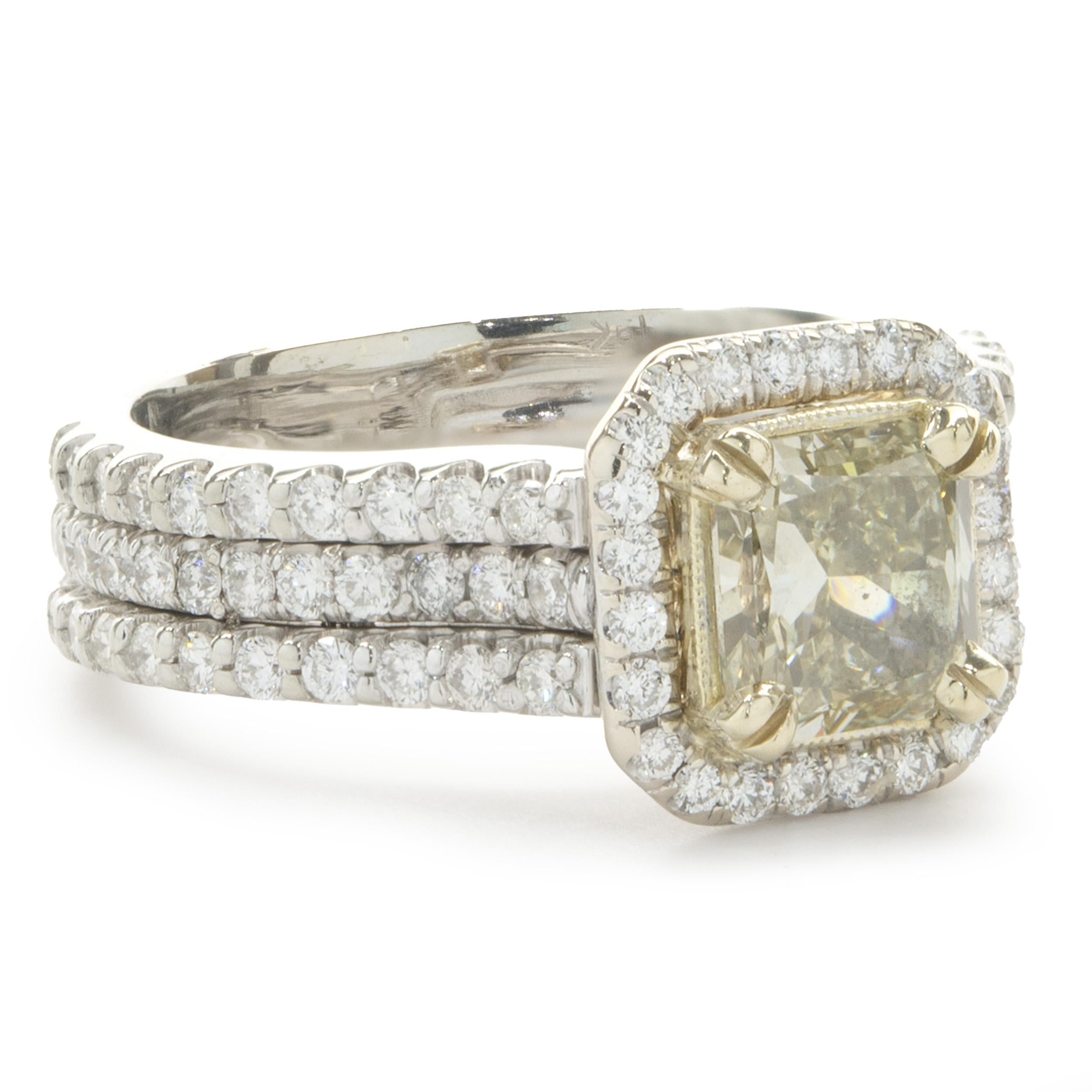 Designer: custom
Material: 18K white & yellow gold
Diamond: 1 radiant cut = 1.56ct
Color: Fancy Yellow
Clarity: VS2
Diamond: 88 round brilliant = 1.57cttw 
Color: G
Clarity: SI1
Ring Size: 7 (please allow two additional shipping days for sizing