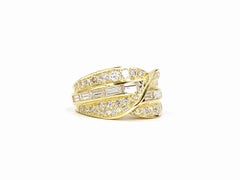 18 Karat Wide Baguette and Round Diamond Ring