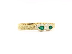 18 Karat Woven Bangle with Emeralds and Diamonds