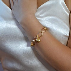 Bracciale con cuore a doppia catena in oro giallo e rosa 18 carati