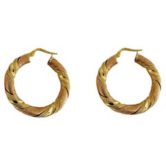 18 Karat Yellow and Rose Gold Two Tone UnoAErre Twisted Hoop Earrings, Italy
