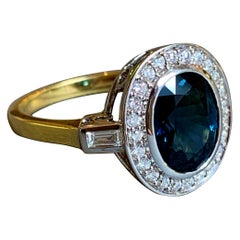 18 Karat Yellow and White Gold Blue Sapphire Diamond Cocktail Ring