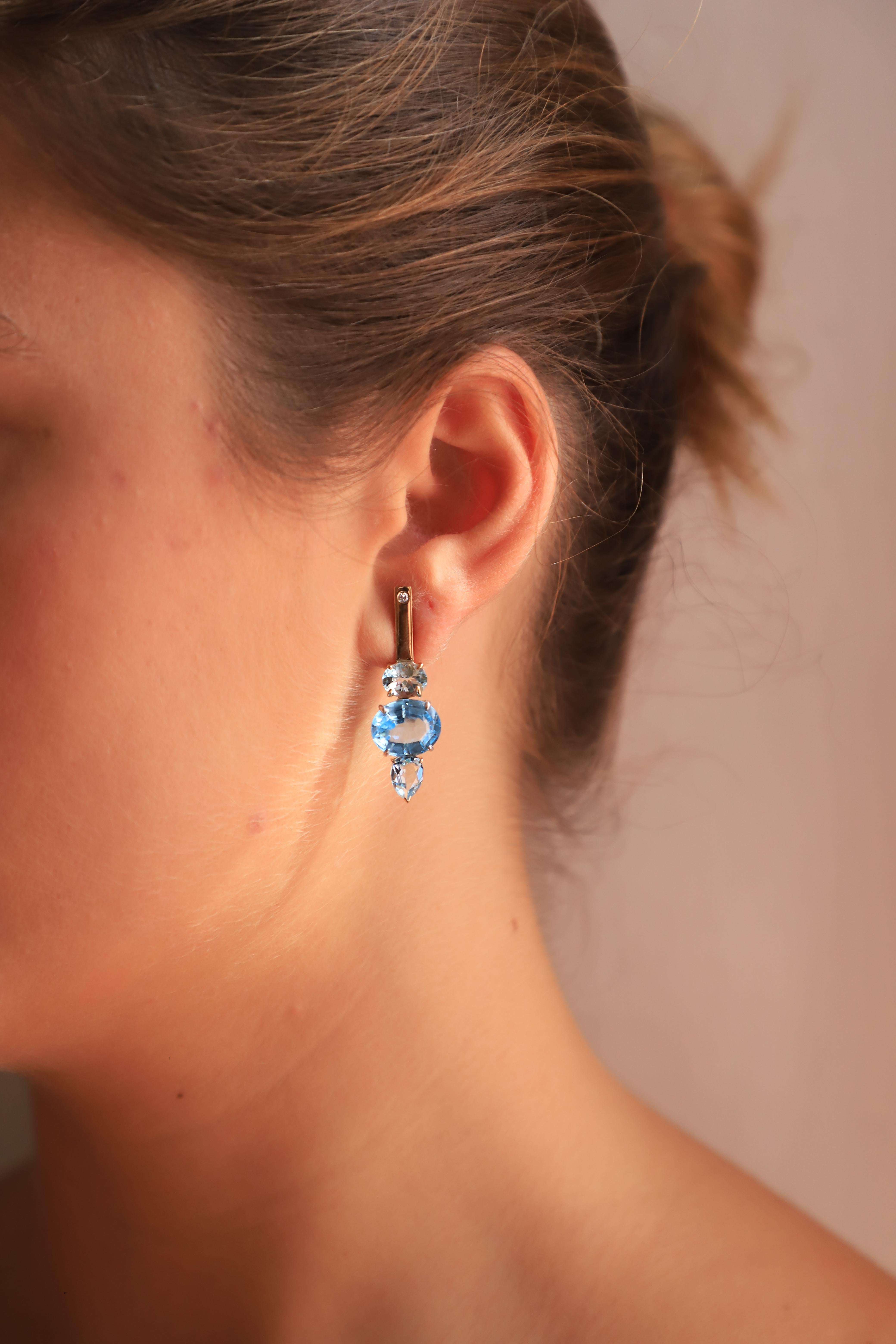 Art Deco 18 Karat Gold Blue Topaz 0.16 Karat White Diamonds Blue Ocean Earrings For Sale
