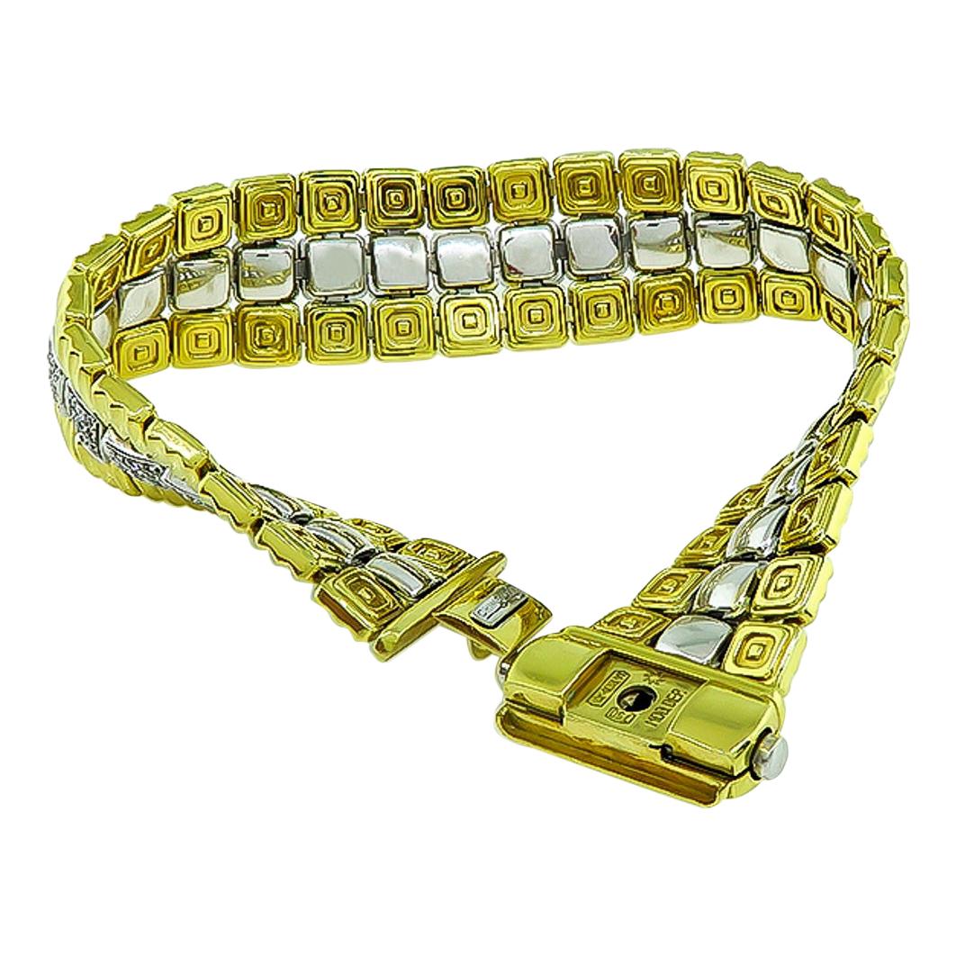 This amazing two tone 18k yellow and white gold bracelet by Chimento is set with sparkling round cut diamonds that weigh approximately 3.50ct. graded G color  with VS clarity. The bracelet measures 7 1/2 inches in length and 18mm in width. It is