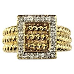Bague à boucle en or jaune et blanc 18 carats taille 9 n° 18810
