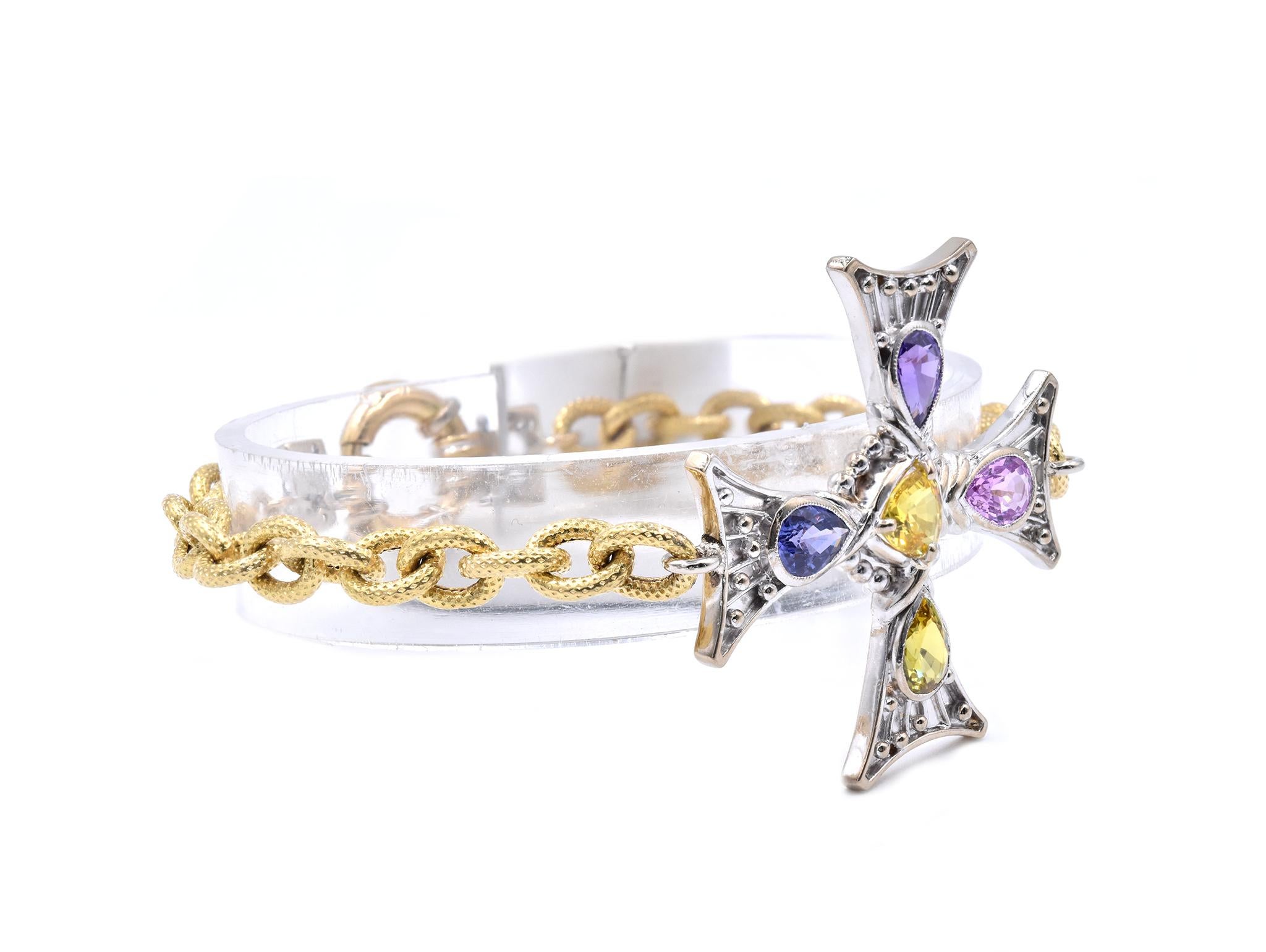 Material: 18K white and yellow gold
Sapphire: pink, green, yellow, violet, and purple
Dimensions: bracelet will fit a 7.5-inch wrist
Weight: 18.39 grams
