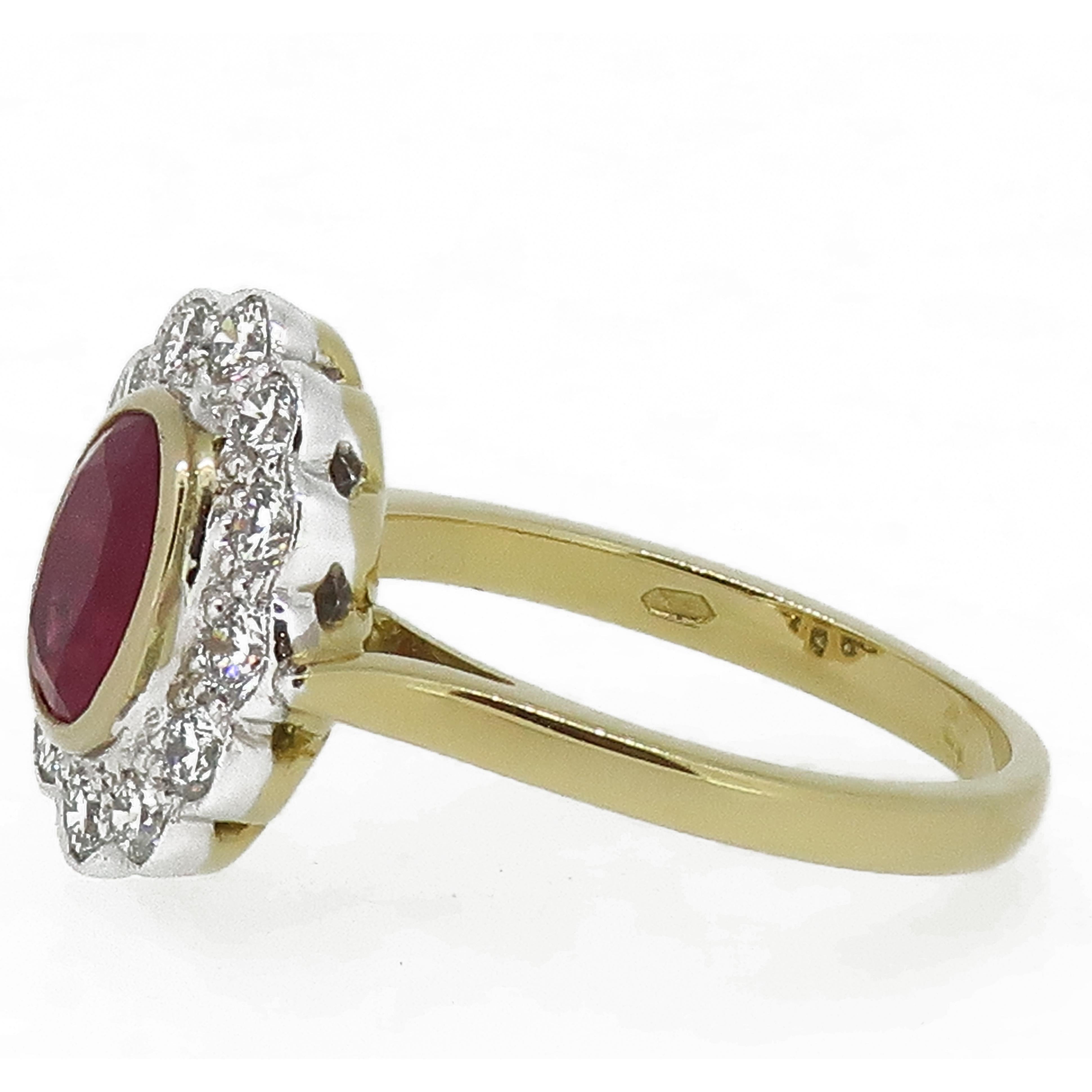 18 Karat Gold Oval Ruby & Diamond Art Deco Style Cluster Ring.

A classic ruby red oval ruby ring. The ruby is set off beautifully in a smooth yellow gold bezel, surrounded by twelve white brilliant cut diamonds in a fine white gold mill-grain