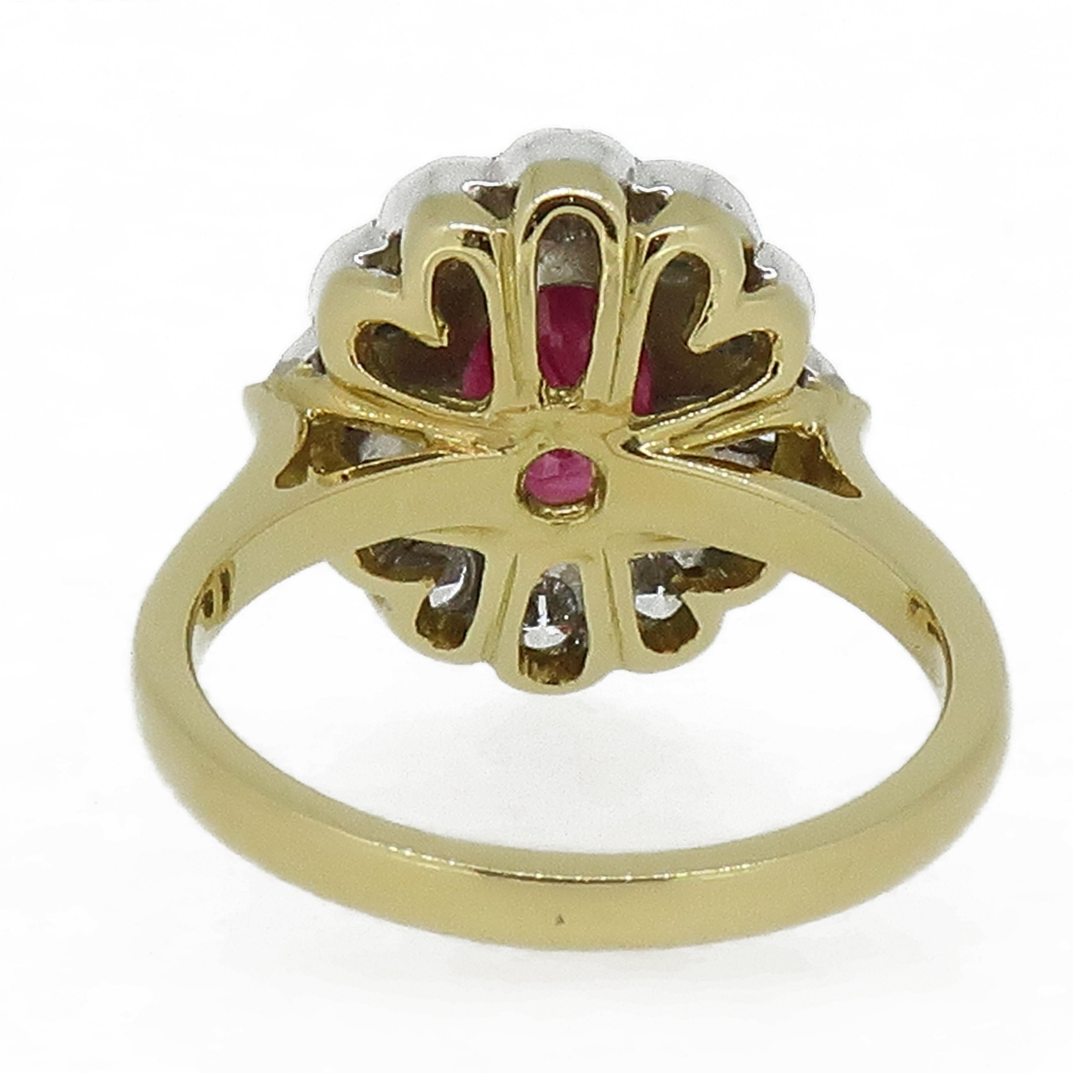 Oval Cut 18 Karat Yellow and White Gold Oval Ruby and Diamond Art Deco Style Cluster Ring For Sale
