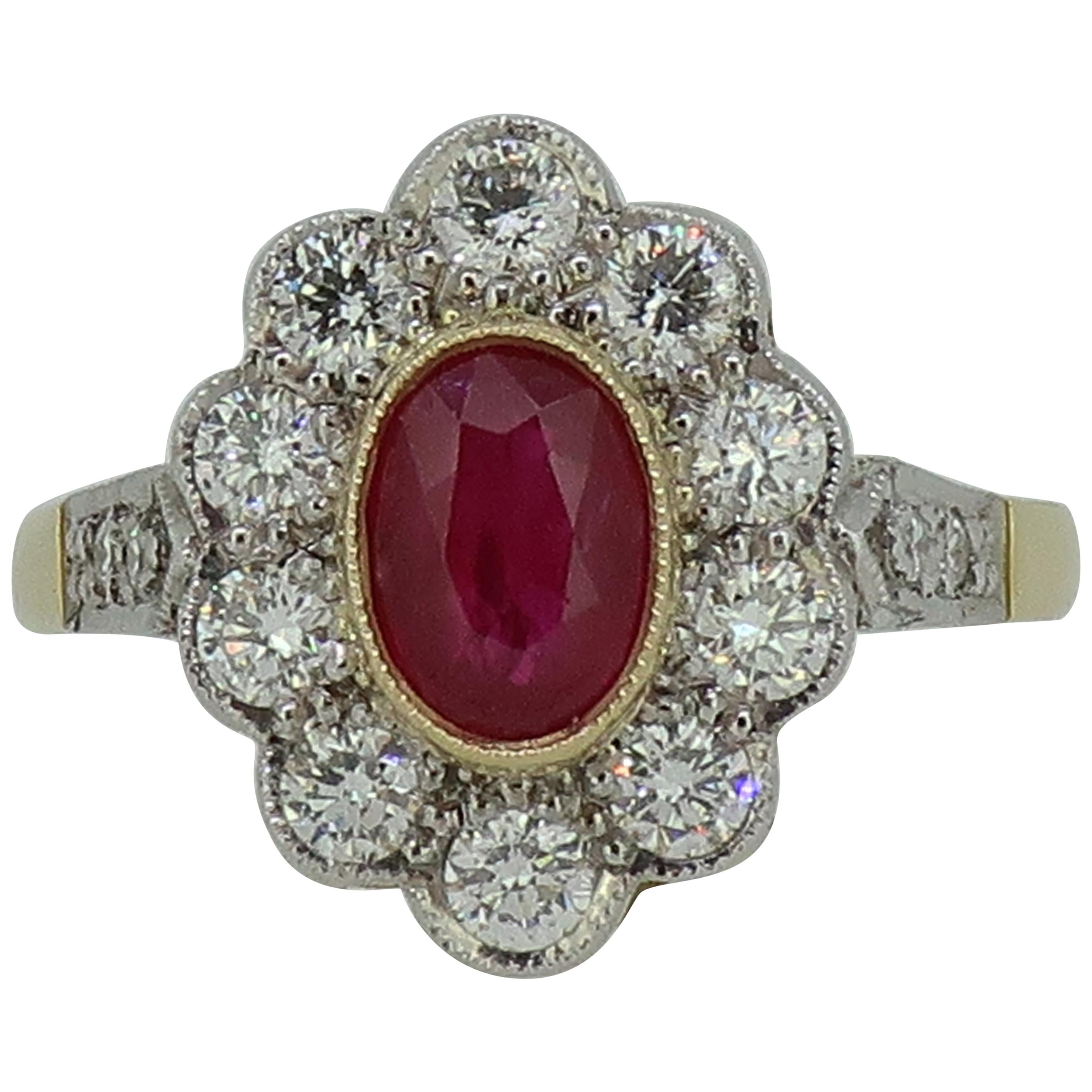 18 Karat Yellow and White Gold Oval Ruby and Diamond Art Deco Style Cluster Ring For Sale