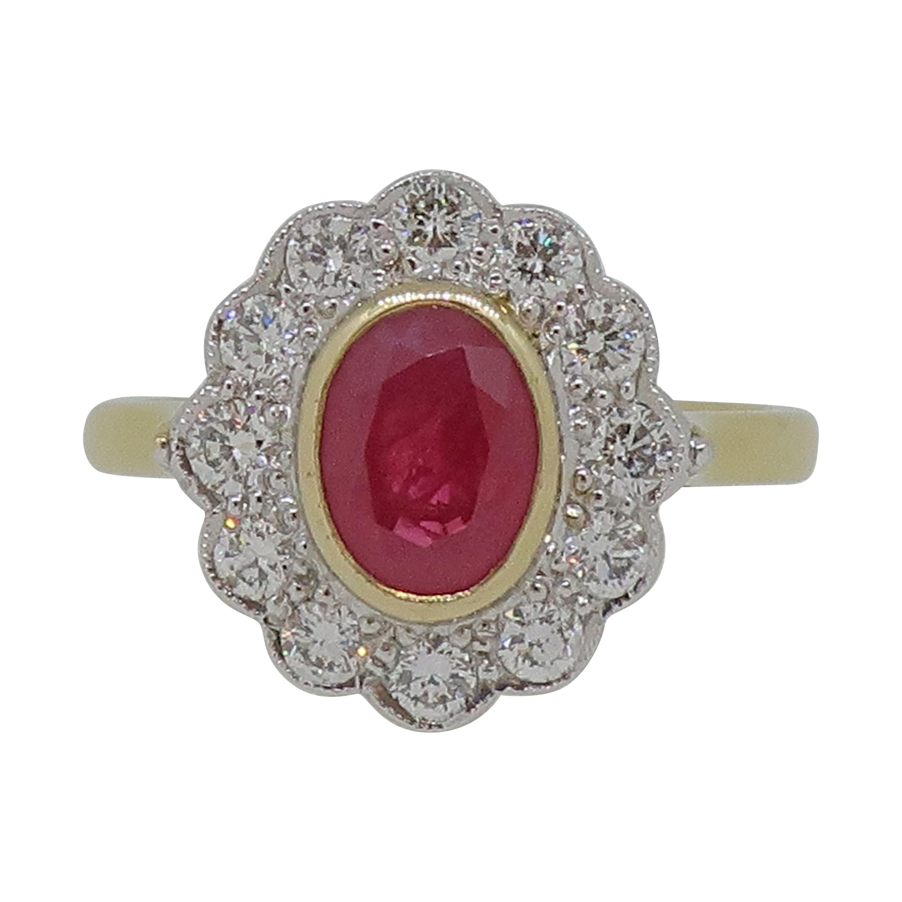 18 Karat Yellow and White Gold Oval Ruby and Diamond Art Deco Style Cluster Ring For Sale