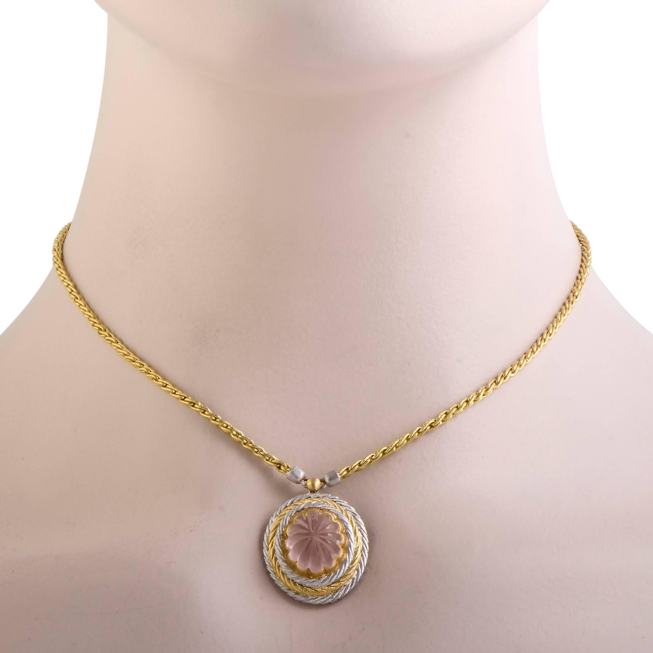 This lavish pendant necklace from Buccellati is rendered in a layering of yellow gold with white gold where two warm contrasting tones complement each other. It is topped with a scalloped tourmaline stone in a pastel shade of pink which looks very