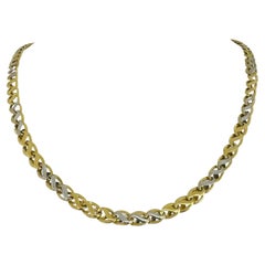 Collana a catena a maglie fantasia in oro giallo e bianco 18 carati Italia