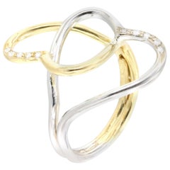 Bague en or jaune et blanc 18 carats avec diamants blancs