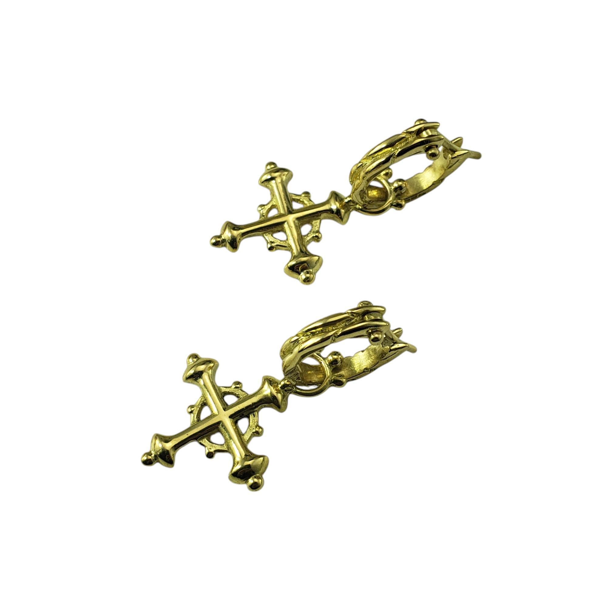 18 Karat Yellow Gold Cross Charm Dangle Hoop Earrings-

These classic hoop earrings feature dangling cross charm to add a touch of flair to any ensemble. Crafted in meticulously detailed 18K yellow gold.

Cross charms can be removed and hoops worn