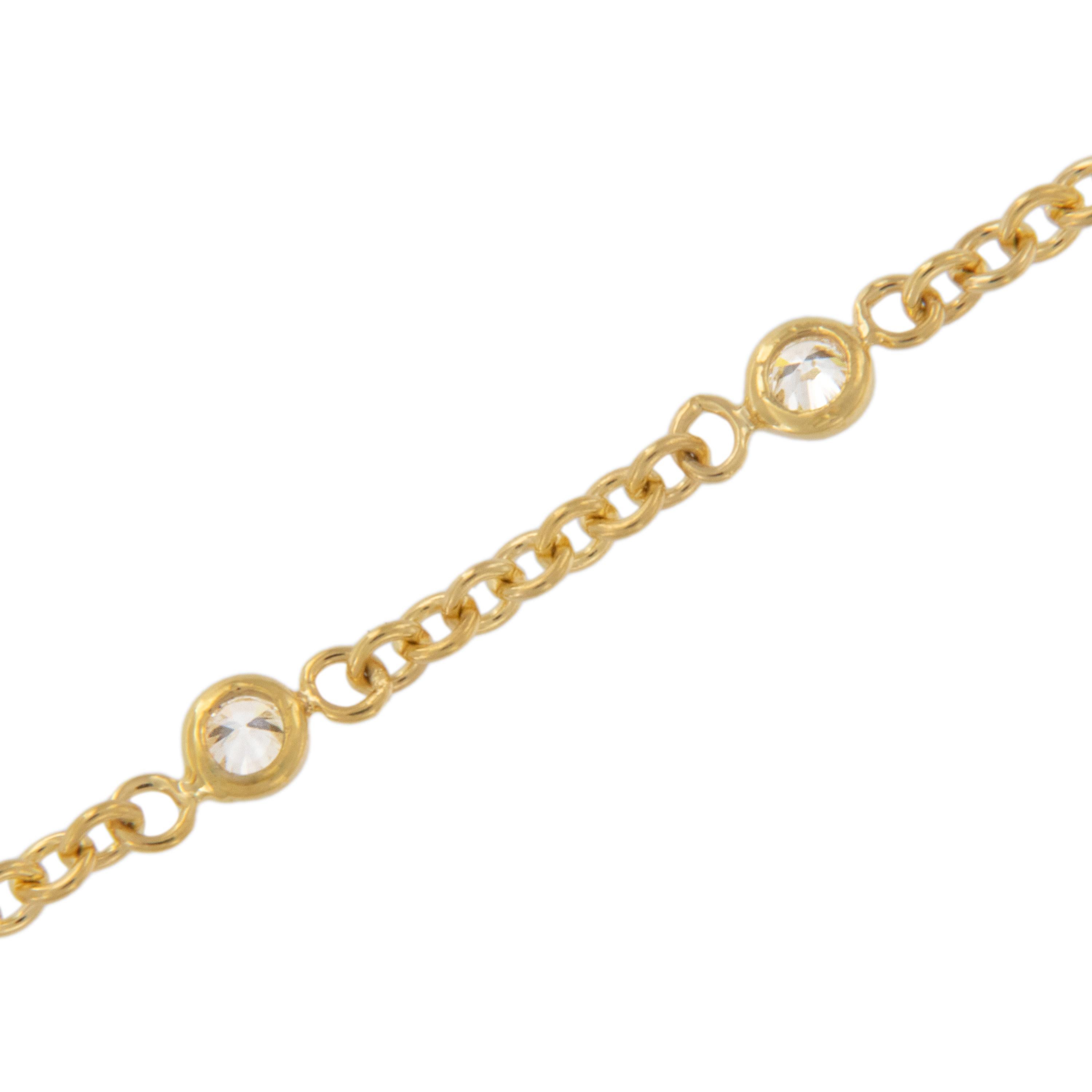 This perfect everyday bracelet contains 1/4 Cttw of fine natural diamonds bezel set at 1/2