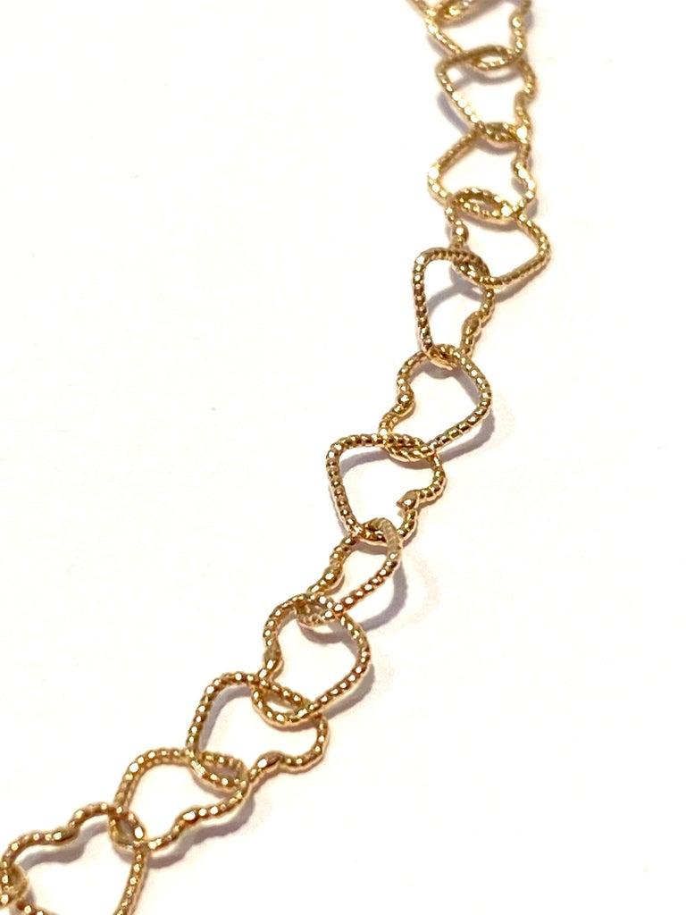Women's or Men's 18 Karat Yellow Gold 0.32 Karat Bead Cut Red Ruby Little Hearts Chain Bracelet For Sale