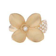 Anello con fiore di diamante in oro giallo 18 carati da 0,42 carati