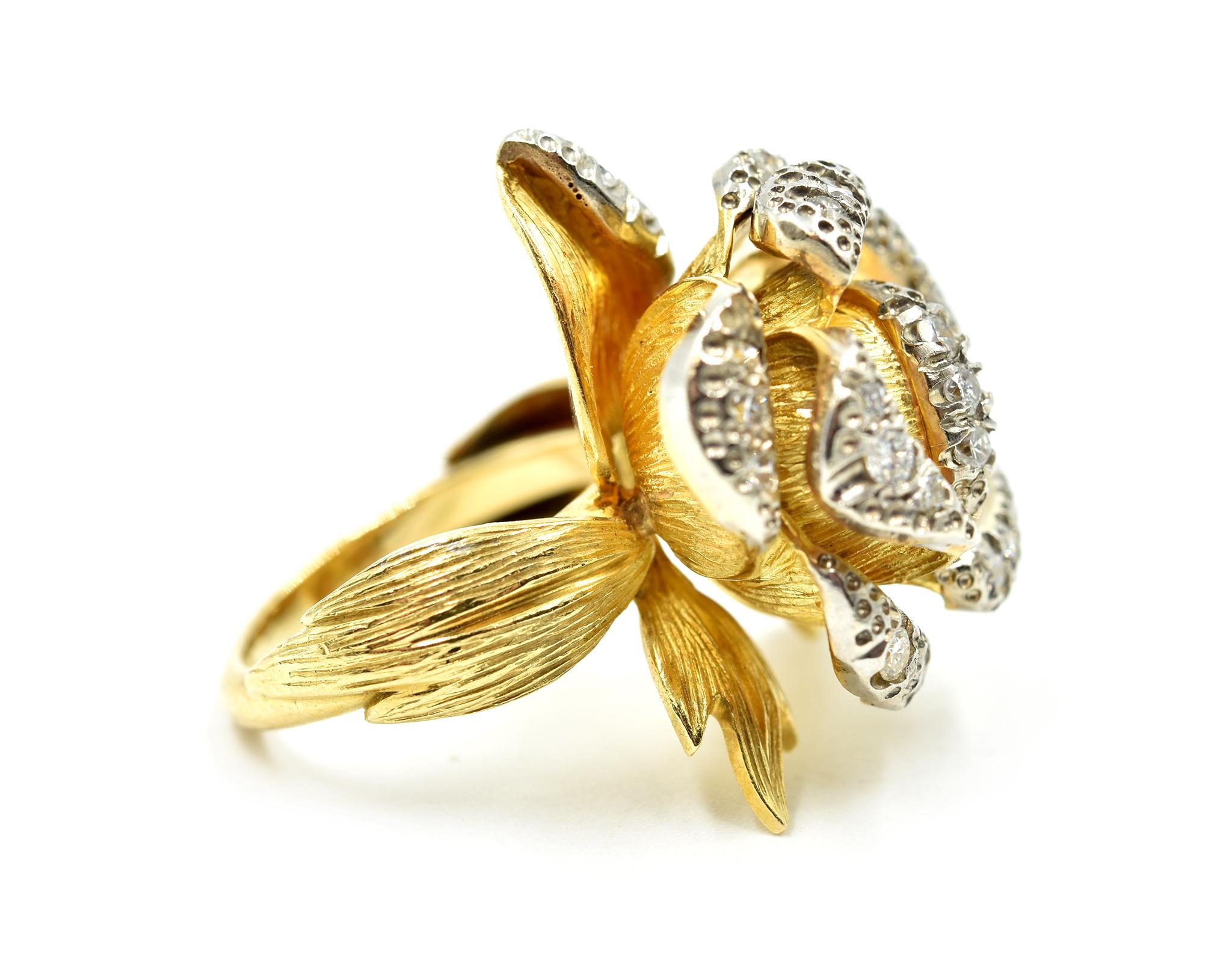 Intricately crafted to become a beauty! This elegant flower cocktail ring is made in 18k yellow gold with round diamonds prong set on top! Diamonds total to 20 stones and carat weight is 0.50 carats. The top of the flower cocktail ring measures