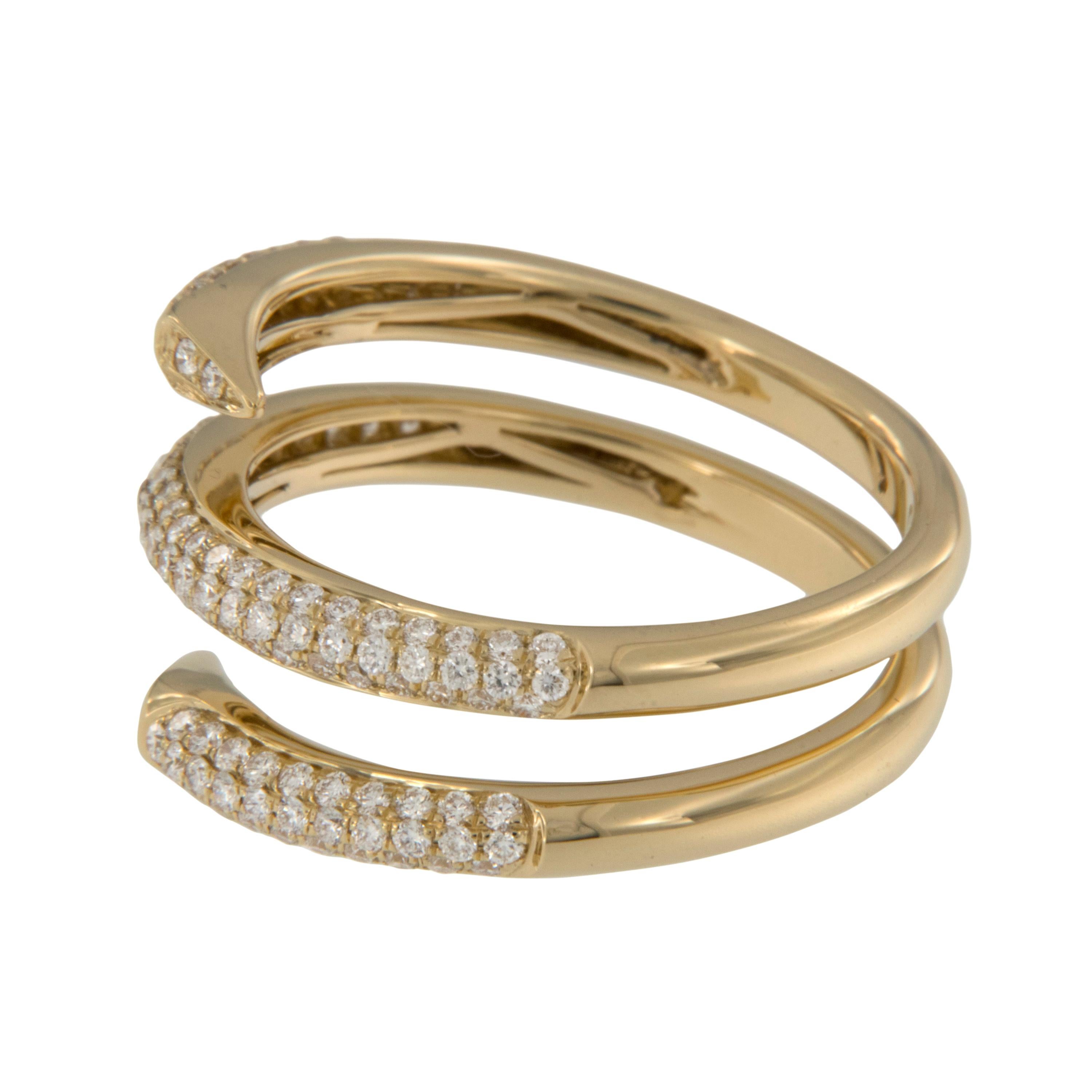 This stylish royal 18 karat yellow gold wrap around spiral ring is further accented with fine 0.67 Cttw pave' set diamonds for an eye catching look! Fantastic fashion ring or contemporary wedding band  in a size 6.5. Complimentary signature wrapping