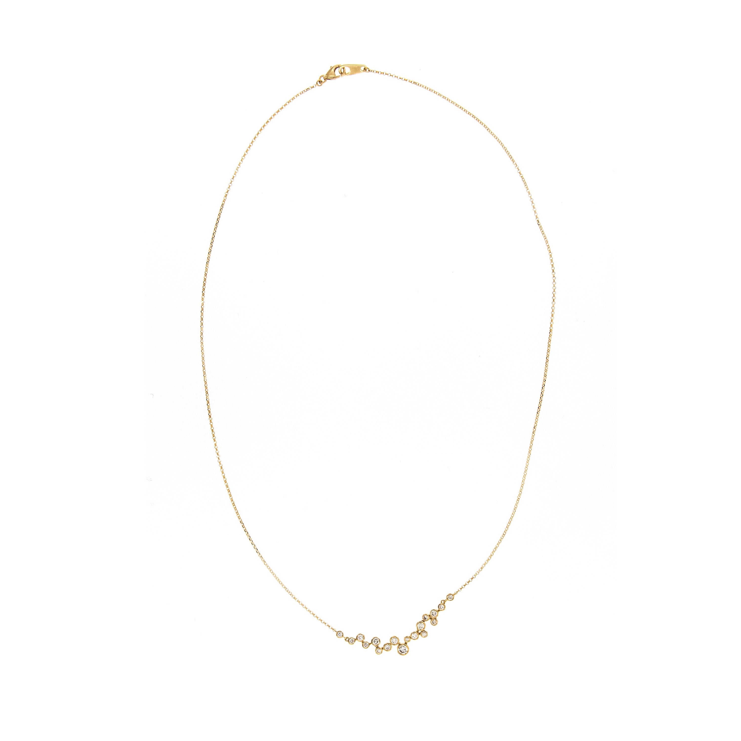 C'est pour la personne pétillante de votre vie ! Fabriqué en or jaune 18 carats avec 18 diamants ronds de taille brillant sertis en style bulle = 0.69 Cttw (VS, G-H). Le collier mesure 18