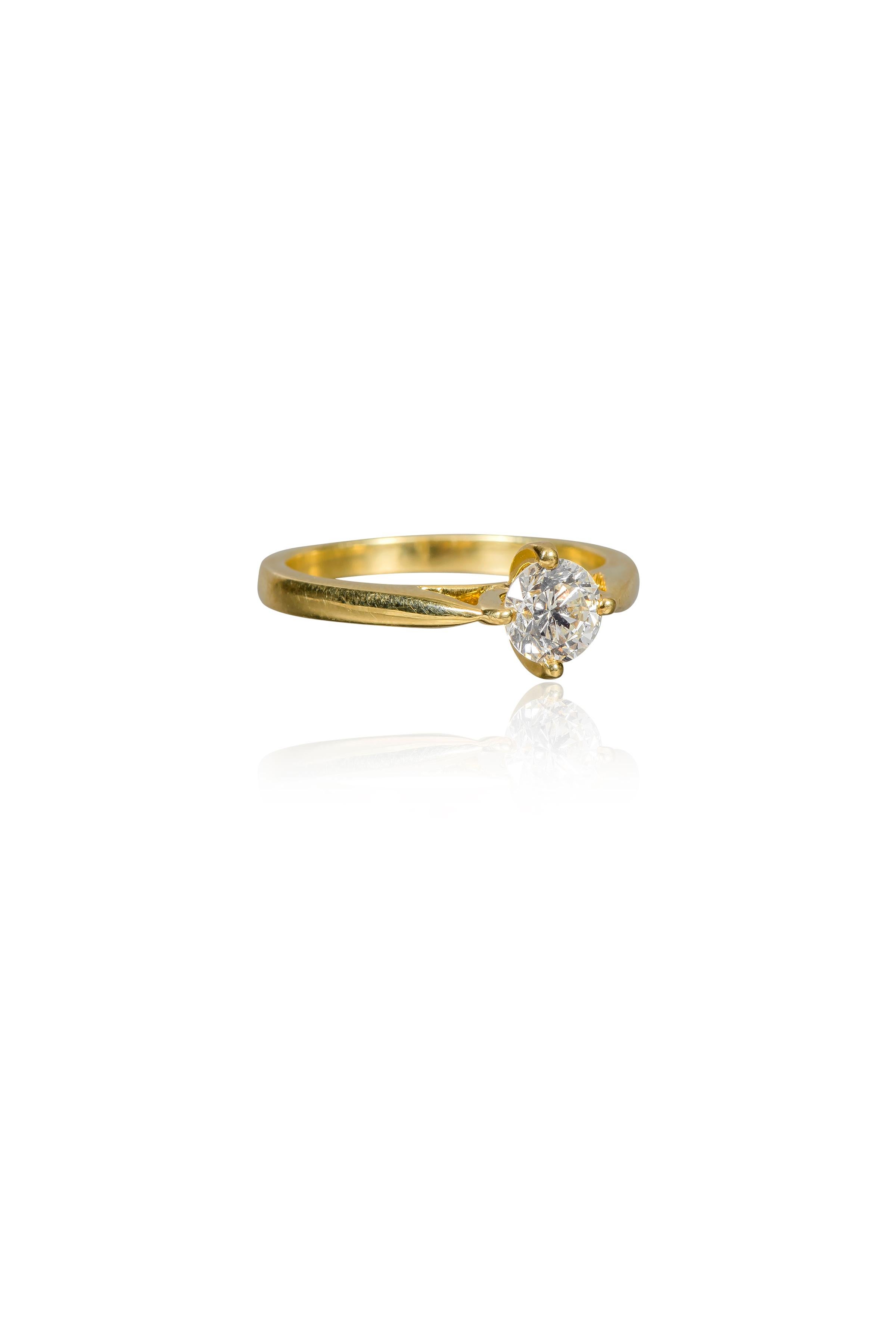 18 Karat Yellow Gold 0.70 Carat Diamond Brilliant-Cut Solitaire Engagement Ring

This magnificent solitaire round diamond engagement ring is eternal. The perfect brilliant round diamond solitaire of 0.70 carats held in the timeless four-edged prong
