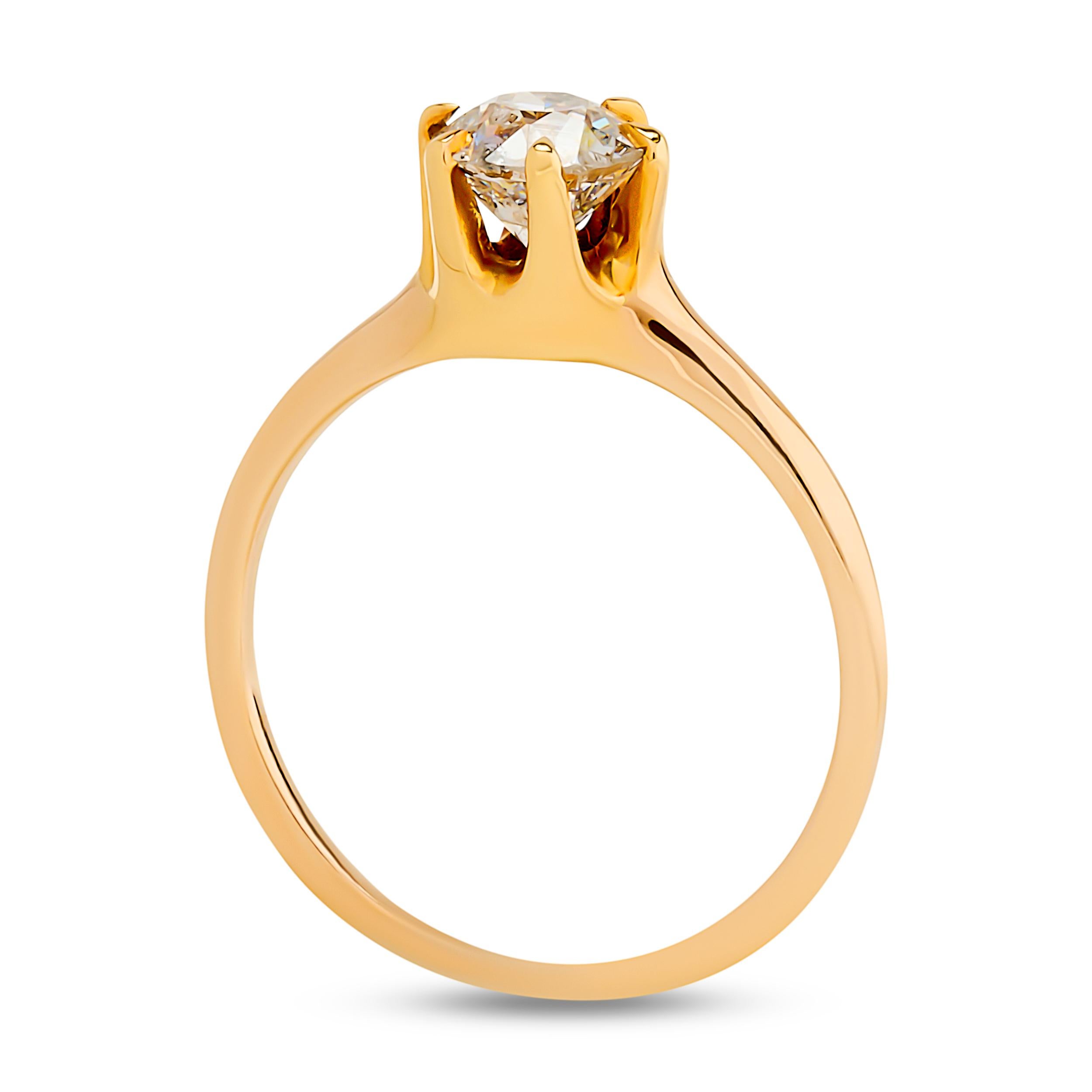 This 14 karat yellow gold ring features a classic old European cut diamond held by six prongs in a simple, elegant setting, showcasing the warm tone of the gold and the unique sparkle of the antique diamond cut.

Center Old European Cut Diamond -