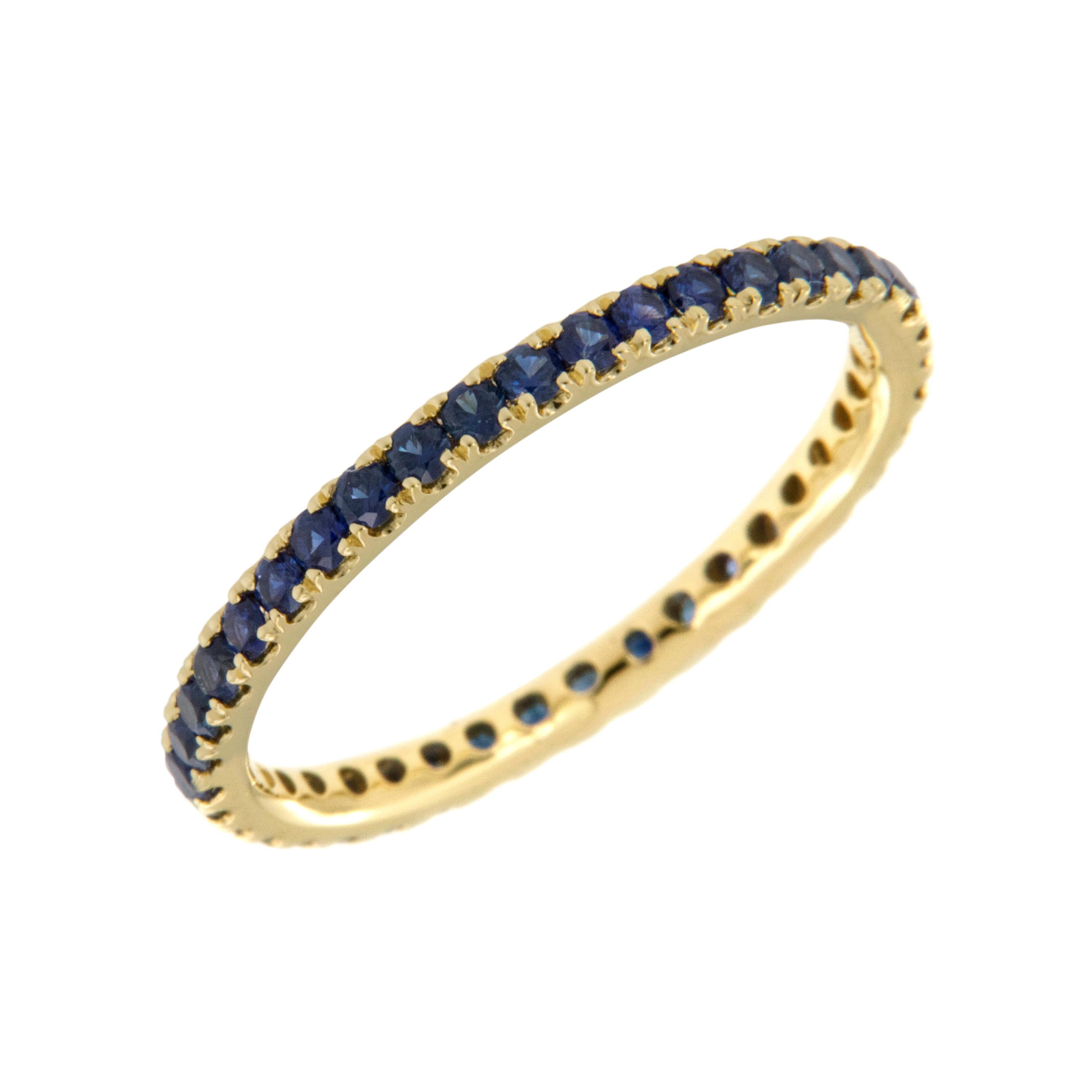 Serine is this 18 karat yellow gold blue sapphire eternity ring with 39 sapphires = 0.78 Cttw in a size 6! Sapphire is the birthstone for September and also given as a gem for the 5th, 23rd and 45th wedding anniversaries. This ring looks fantastic