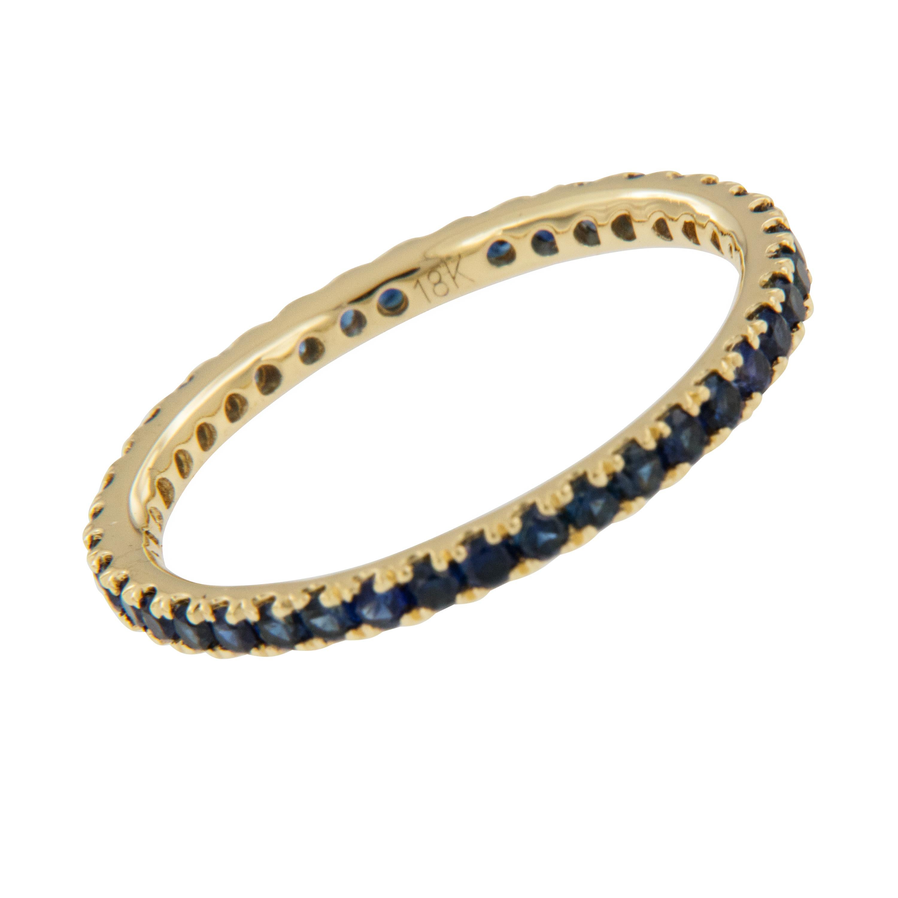 Round Cut 18 Karat Yellow Gold 0.78 Cttw. Blue Sapphire Eternity Band Ring For Sale