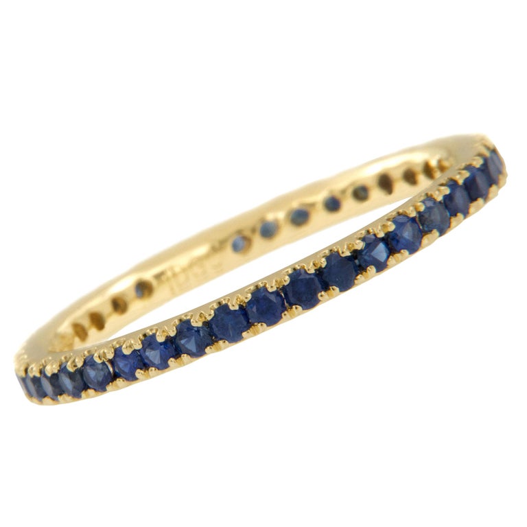 18 Karat Yellow Gold 0.78 Cttw. Blue Sapphire Eternity Band Ring For Sale