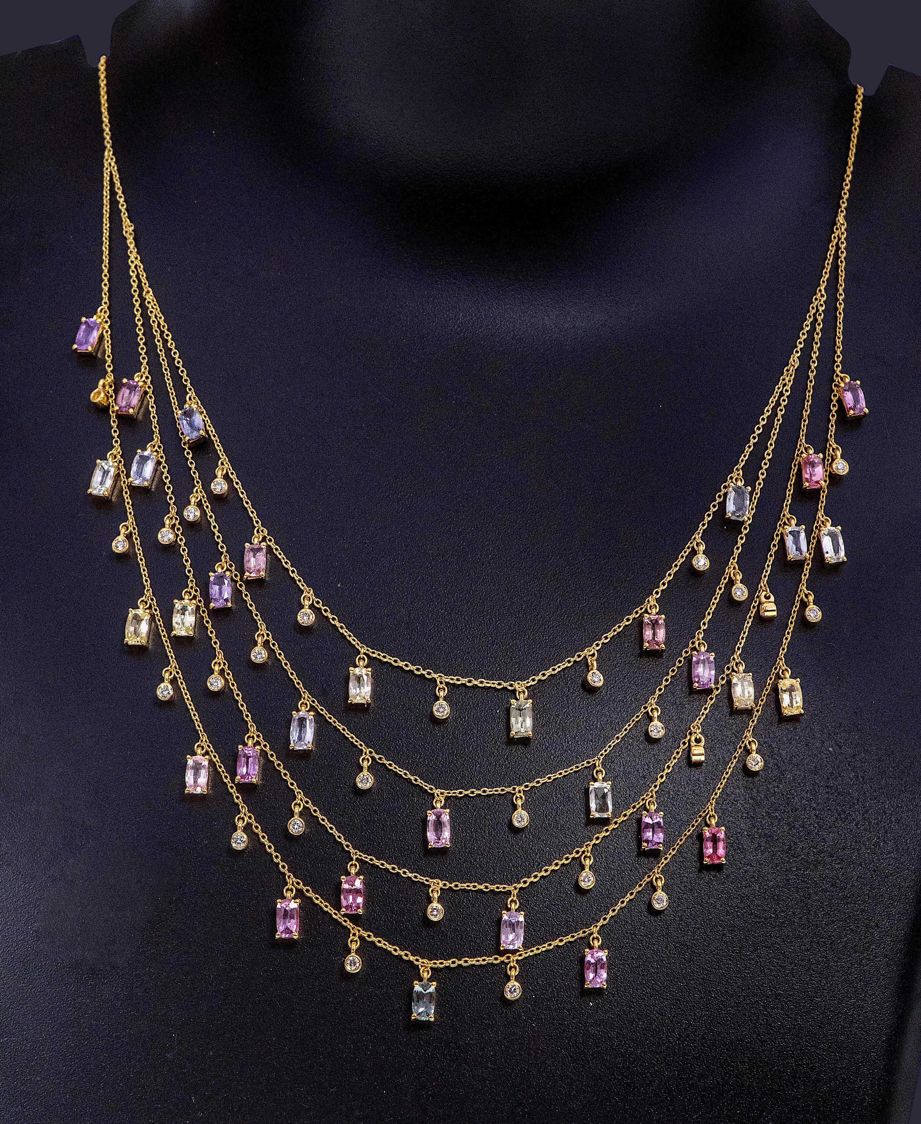 18 Karat Yellow Gold 10.09 Carat Multi-Sapphire and Diamond Multi-Strand Necklace

This exquisite contemporary rainbow multi-sapphire and diamond hanging multi-layer necklace is exemplary. The necklace is designed stylishly with an uneven size of