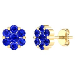 Clous d'oreilles fleur en or jaune 18 carats et saphir 1,01 carat