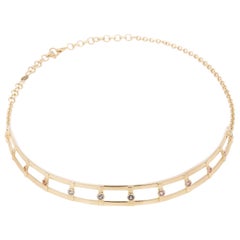 Collana girocollo in oro giallo 18 carati con 12 zaffiri taglio brillante