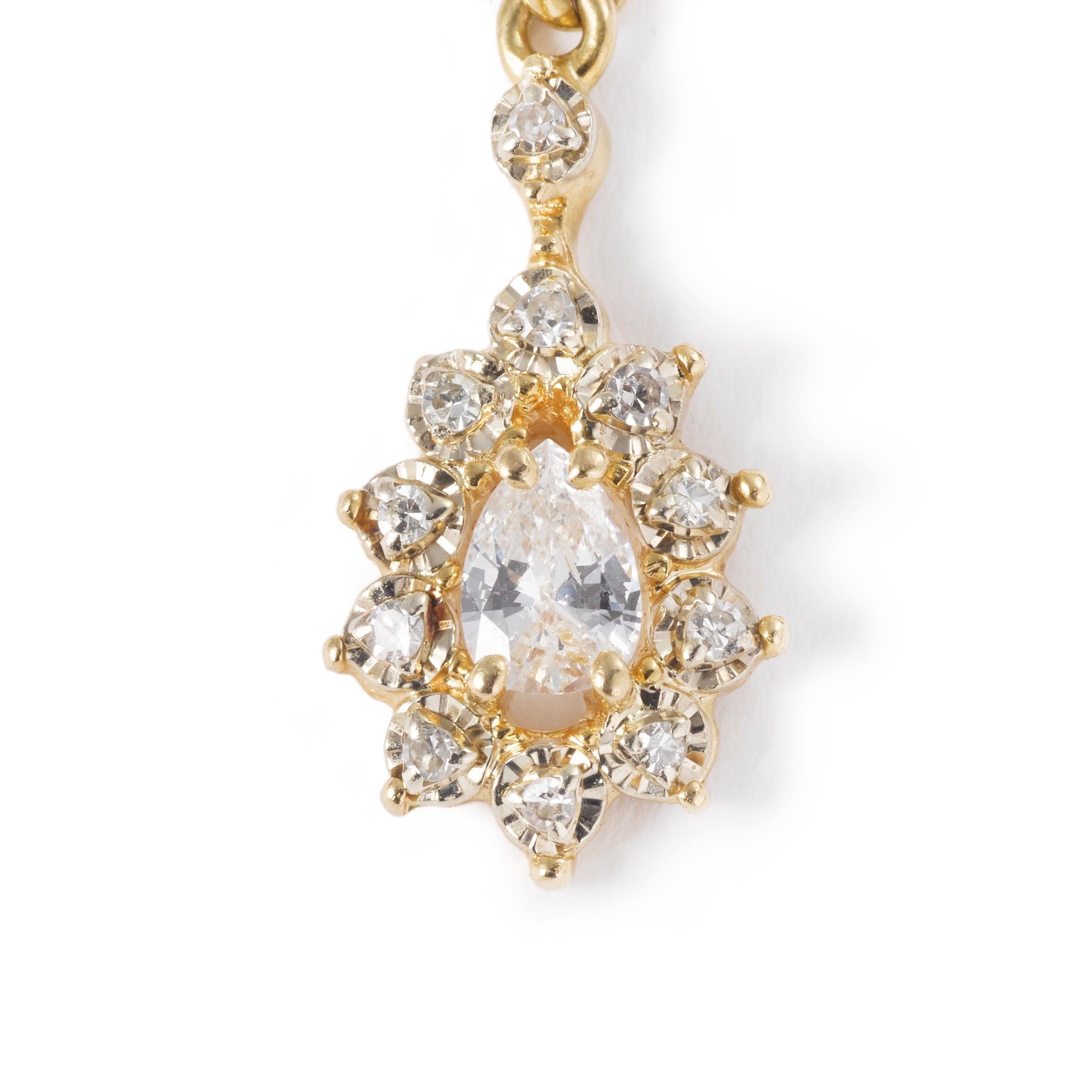 Contemporary 18 Karat Yellow Gold 1.30 Carat Pear Diamond Dangle Earrings