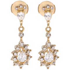 18 Karat Yellow Gold 1.30 Carat Pear Diamond Dangle Earrings