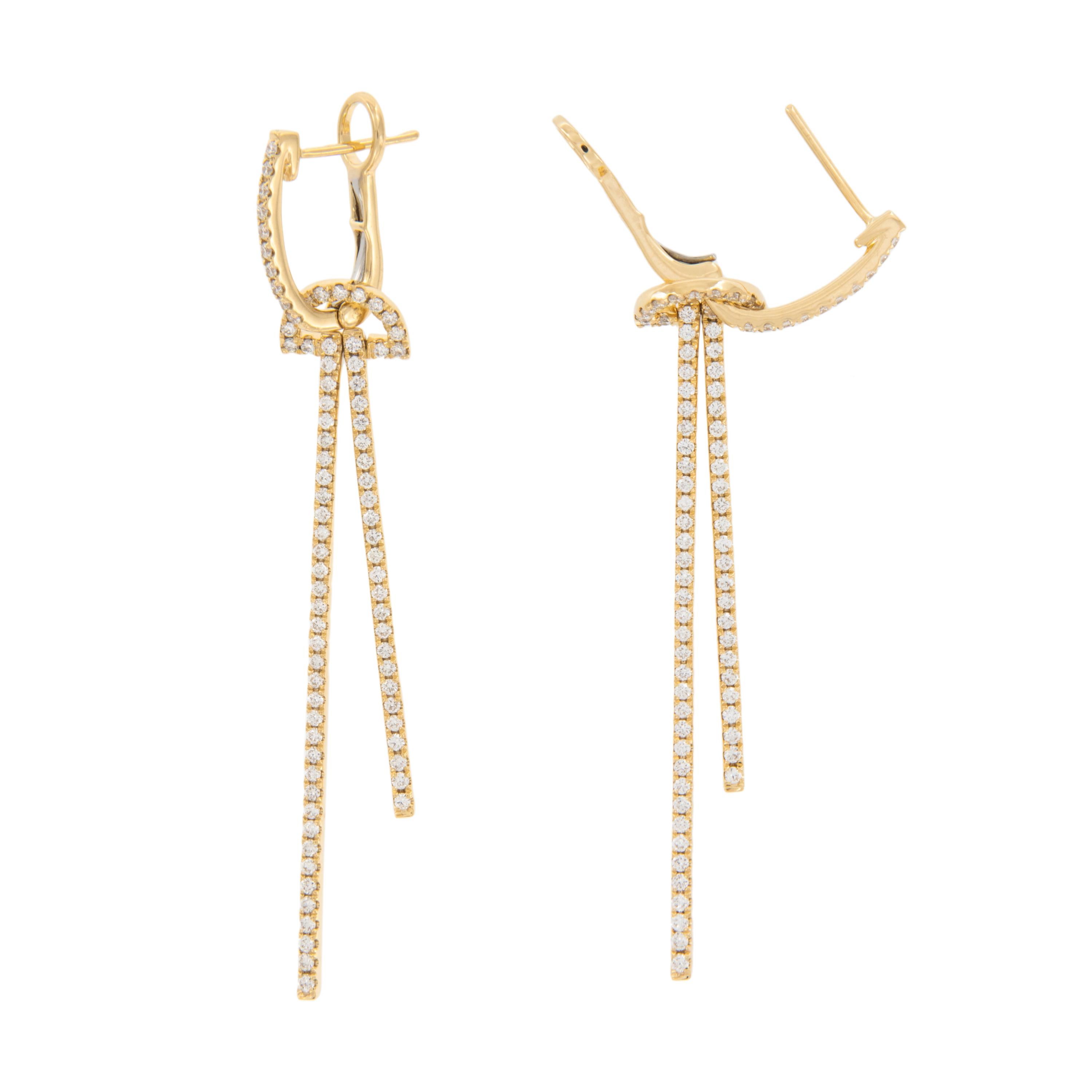 Iconic Art Deco style married to rich 18 karat yellow gold and diamonds - these eye catching earrings are a must have! From semi hoop top and half circle hang two diamond sticks of different lengths, both being free moving to sway & catch the light