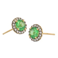 18 Karat Yellow Gold 1.37 Cttw Tsavorite and 0.25 Cttw Diamond Halo Stud Earring