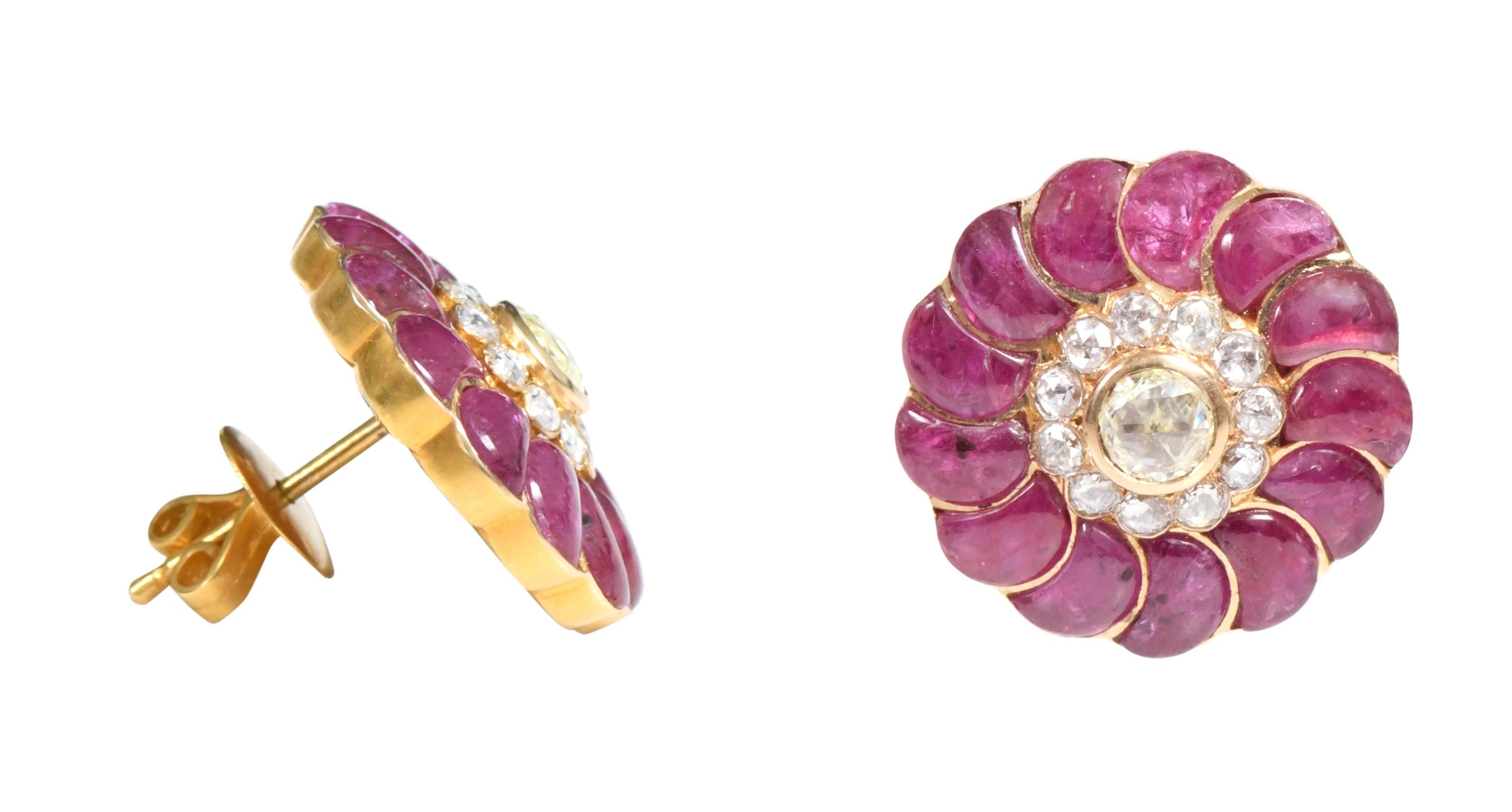 18 Karat Yellow Gold 13.73 Carat Ruby and Diamond Flower Stud Earrings

This magnificent crimson red ruby and rose cut solitaire diamond earring is an incredible feisty stylish design. The solitaire rose cut diamond in a yellow gold closed setting