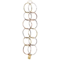 18 Karat Yellow Gold, 14 Karat Pink Gold and Sterling Silver Link Bracelet