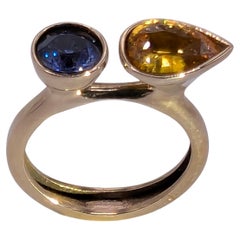 18 Karat Yellow Gold 1.43 Carat Yellow sapphire and  1.05 Carat Blue Sapphire